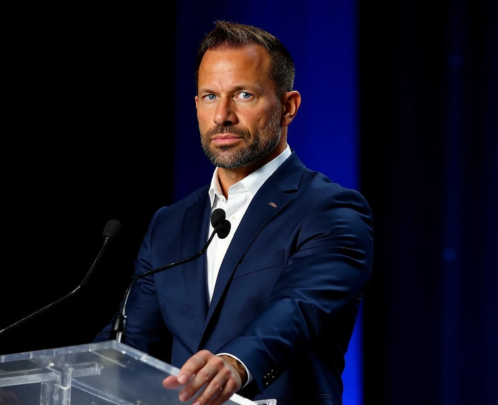 Thomas Glaus speaking at a lectern